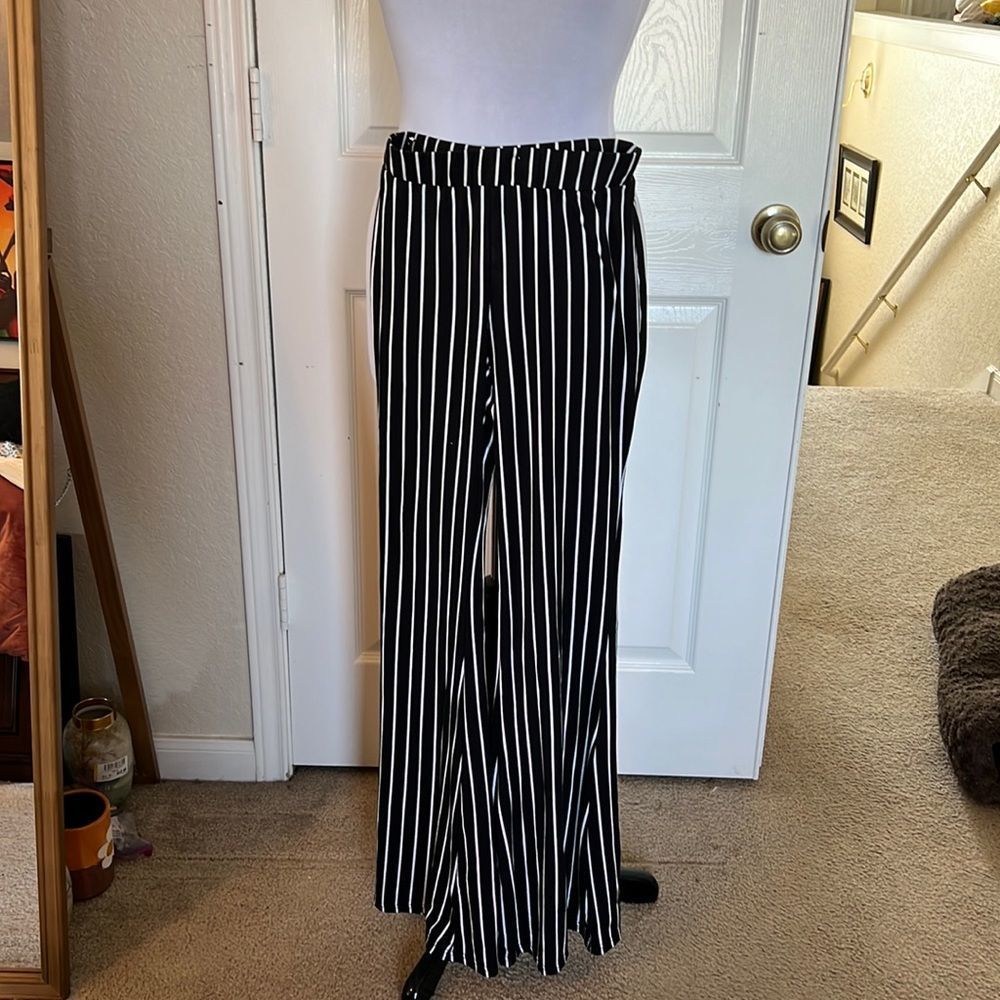 Y2K Black and white vertical stripped pants.  Flared leg.
